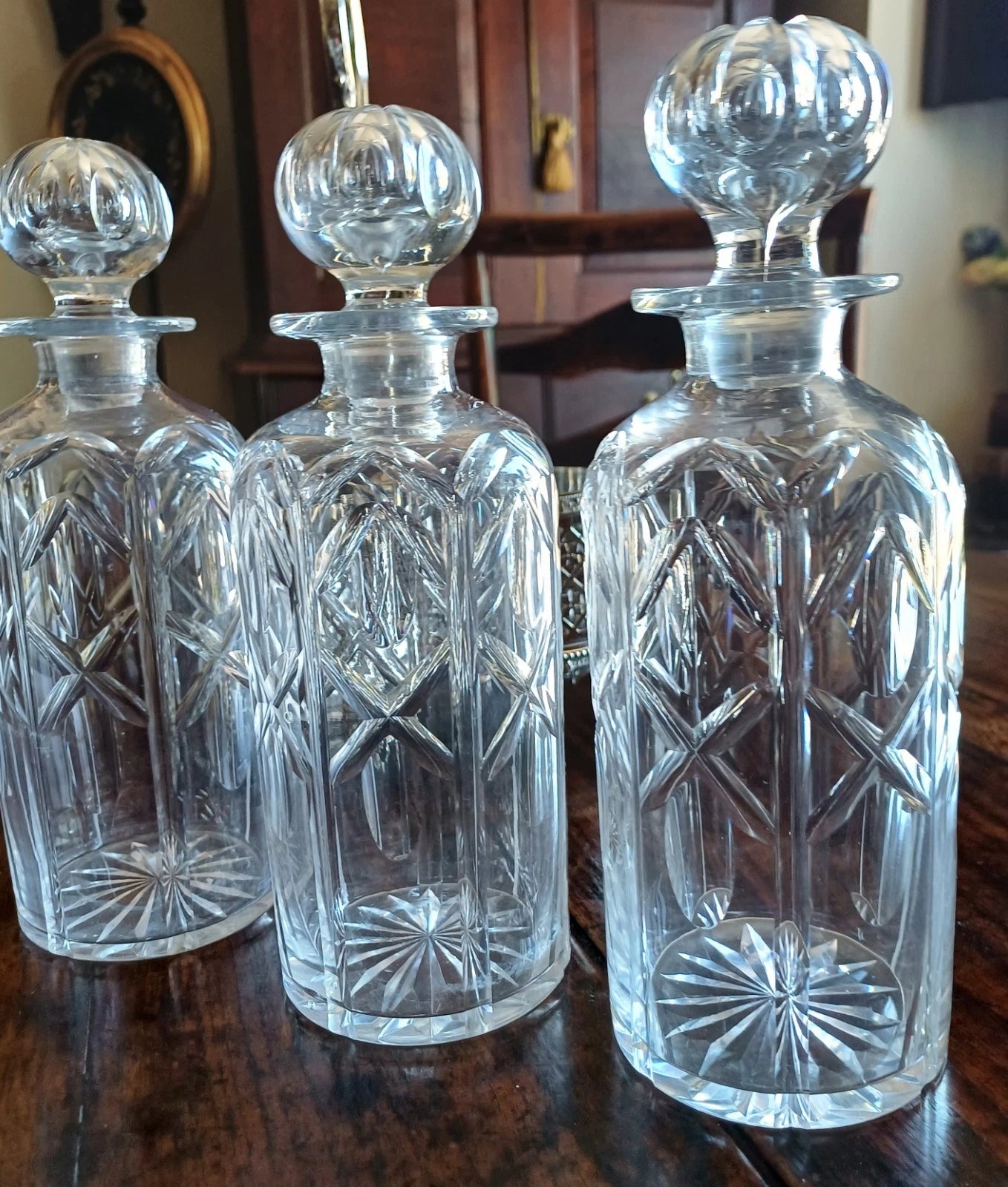Antique Silver Plate Tantalus with the original crystal decanters
