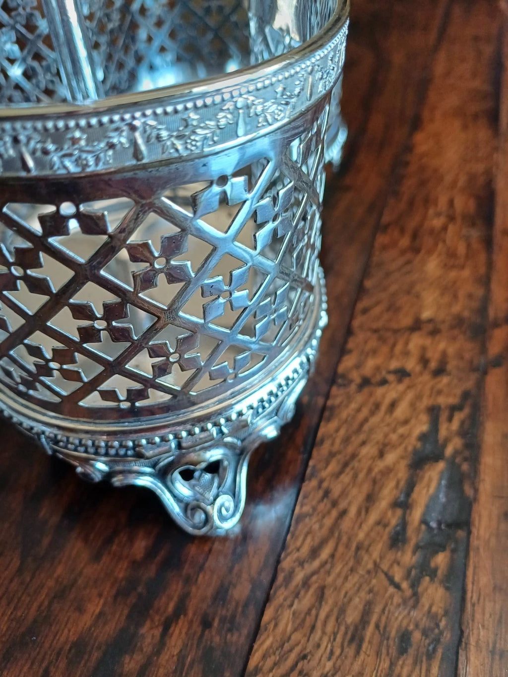 Antique Silver Plate Tantalus with the original crystal decanters